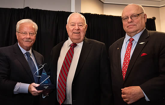 Jack Pelton (left), who helped introduce Clay Lacy (center), said underneath Clay’s accomplishments is a tremendously good guy, a man who “has time for everyone.” He’s pictured here with Wichita Aero Club President Dave Franson