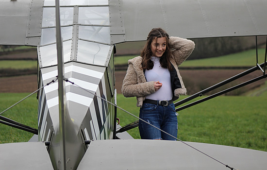 Ellie Carter with the Piper Cub