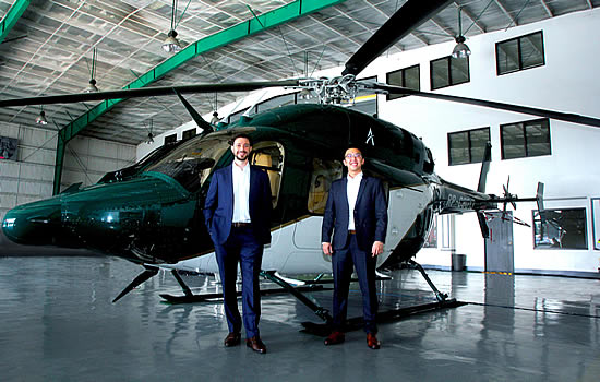 Ascent Founder and CEO Lionel Sinai-Sinelnikoff (left) and Co-founder and COO Darren T’ng with a Bell 429 employed on the company’s Philippines operation.