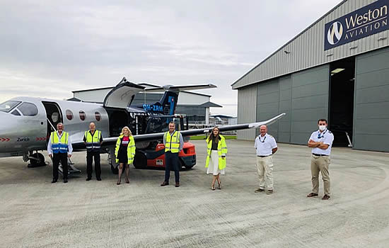 Weston Aviation CEO, Nick Weston (centre) with the Gloucestershire Airport team.