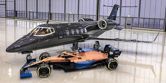 FAI's Learjet 60 with McLaren's race car at its Nuremberg headquarters