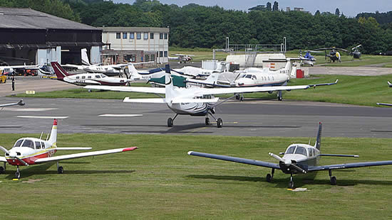 Fairoaks Airport in Chobham, Surrey. The housing plan for the site has gone away - but it could come back. Some 50 plus UK airfields are under threat, GAAC notes.