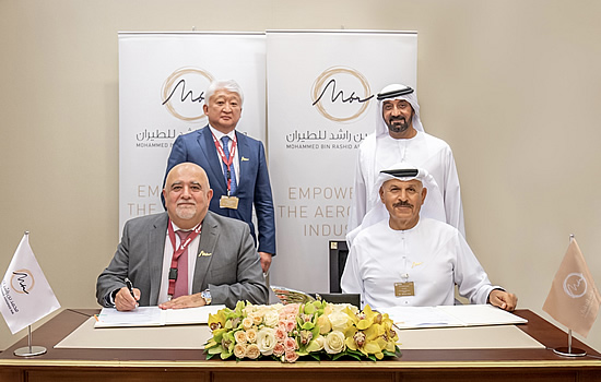 Mr Richard Gaona, Executive chairman & CEO Comlux signing with his Excellency Khalifa Al Zaffin, Executive Chairman of Dubai Aviation Corporation, in presence of His Highness Sheikh Ahmed bin Saeed Al Maktoum, President of the Dubai Civil Aviation Authority, Chairman and Chief Executive of Emirates Airlines and Group and Chairman of Dubai Airports and Mr Vladimir Kim, Comlux. 
