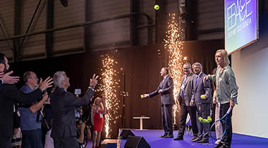 Tennis Champion Martina Navratilova (extreme right) lobs signed tennis balls to an enthusiastic EBACE audience during the opening ceremony.