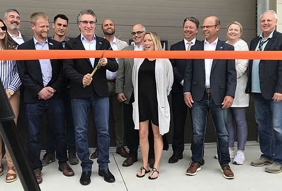 Gov. Doug Burgum cuts the ribbon, officially opening Vantis’ Mission Network & Operations Center.