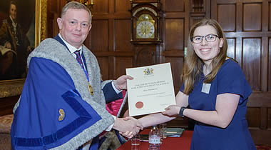 Elise Hammond accepts her Air bp Sterling Pilot Scholarship Award from Nick Goodwyn, Immediate Past Master, the Honourable Company of Air Pilots | photo: www.sharpphoto.co.uk