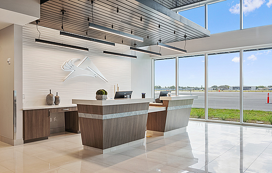 Atlantic FXE’s meticulously designed front desk offers a welcoming and open feel for greeting guests as they enter the new facility.