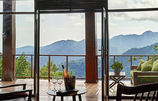 A view of Bwindi Forest from a luxury room at Nkuringo Bwindi Gorilla Lodge, a top choice for gorilla trekking accommodation in Bwindi.