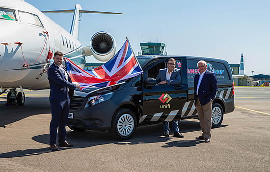 Celebrating a UK/US partnership, at London Oxford Airport: Stefan Murphy, Managing Director, Up & Away Aviation Services with Gautam Thakkar, CEO, Unifi (centre) and Ernie Patterson, Chairman, International Business of parent Argenbright Group.