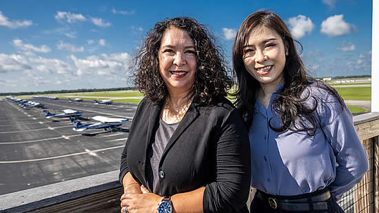 Dr. Barbara Holder (left) was assisted in her research by second-year Aviation PhD student Hui (Angel) Wang.