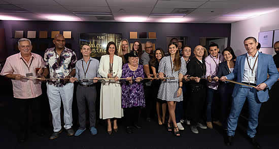 F/LIST celebrates Ft. Lauderdale opening. Katharina List-Nagl and Mayor Paul of Davie (4th and 5th from left) cut the ribbon.