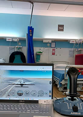 Disabled woman learning to fly from her hospital bed