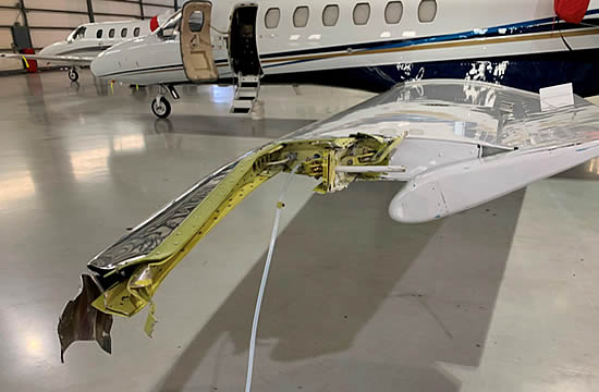 Early photos show nearly 70 inches of wingtip missing.