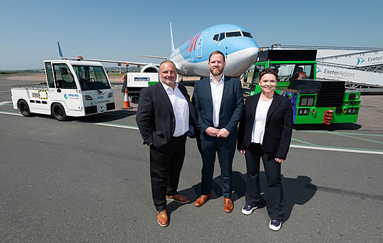 (L to R): Stephen Wiltshire from Exeter Airport, TUI's Brendan Kelly and Cranfield University's Professor Anna Smallwood pictured with the hydrogen-powered equipment during the live aircraft turnaround trial at Exeter Airport on Tuesday 29th April 2025.