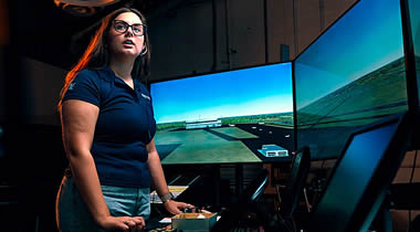 Embry-Riddle student Magdalena Kokenge performs an air traffic simulation exercise in the new Air Traffic Control Laboratory on the Prescott Campus.