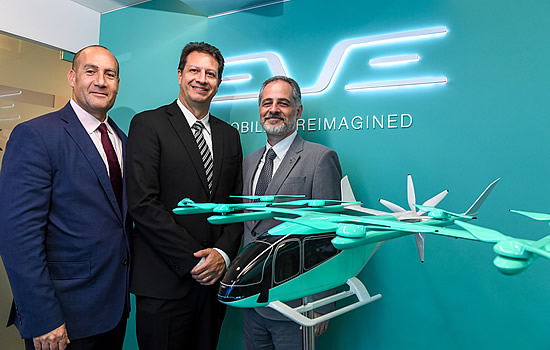 CAE will deliver a breakthrough full flight simulator to Embraer-CAE Training Services 
to train the first wave of Eve Air Mobility pilots. (From L-R): Michel Azar-Hmouda, Luiz Renato Mauad, Vice President of Customer Services, Eve Air mobility, Carlos Naffed, President & CEO of Embraer Services and Support.