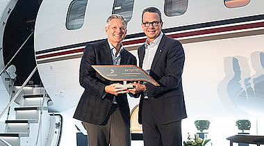 NetJets’ Patrick Gallagher (left) and Bombardier’s David Murray celebrate the delivery of NetJets’ first Global 8000 business at Bombardier’s Laurent Beaudoin Completion Centre.