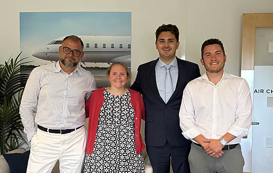Alex Busila (left) with the ACS Monaco launch team.